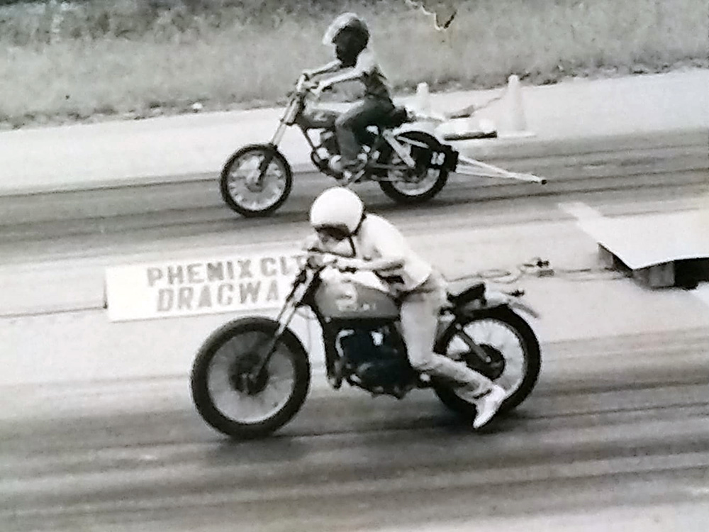 Dan Parker drag racing a motorcycle when he was young